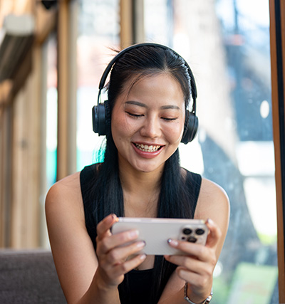 Person watching TV on phone
