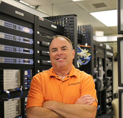 Shentel Employee standing in a server room