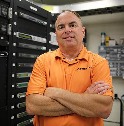 Shentel employee in a server room
