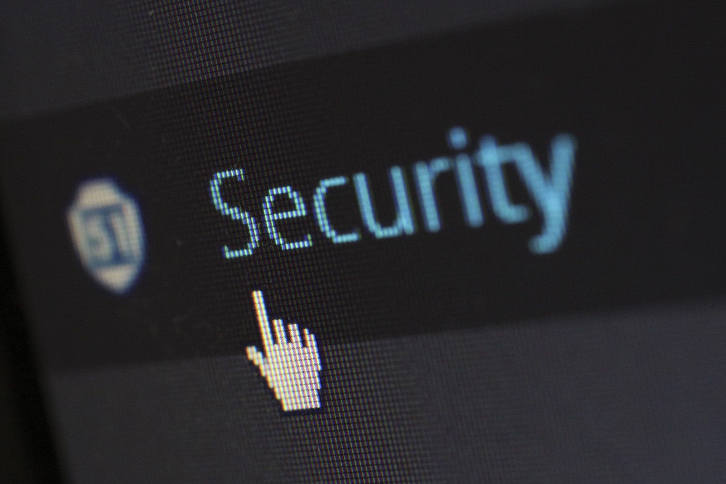 Computer cursor hovering over the word “Security” as user explores cloud data protection options