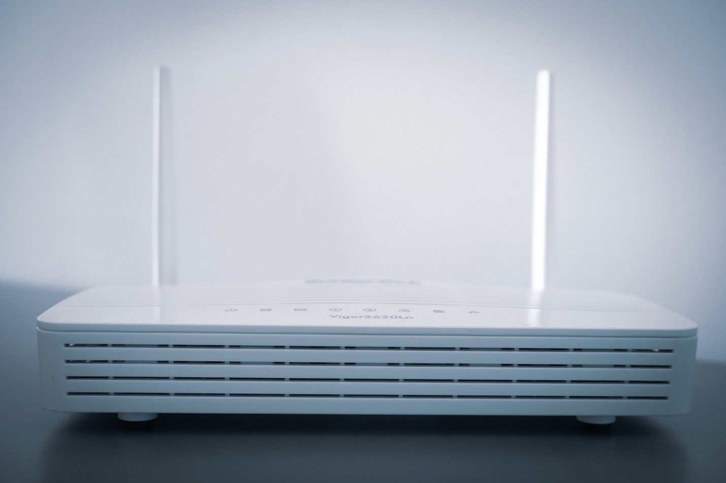 Home WiFi router placed away from obstructions to show ideal placement for strong Internet connection